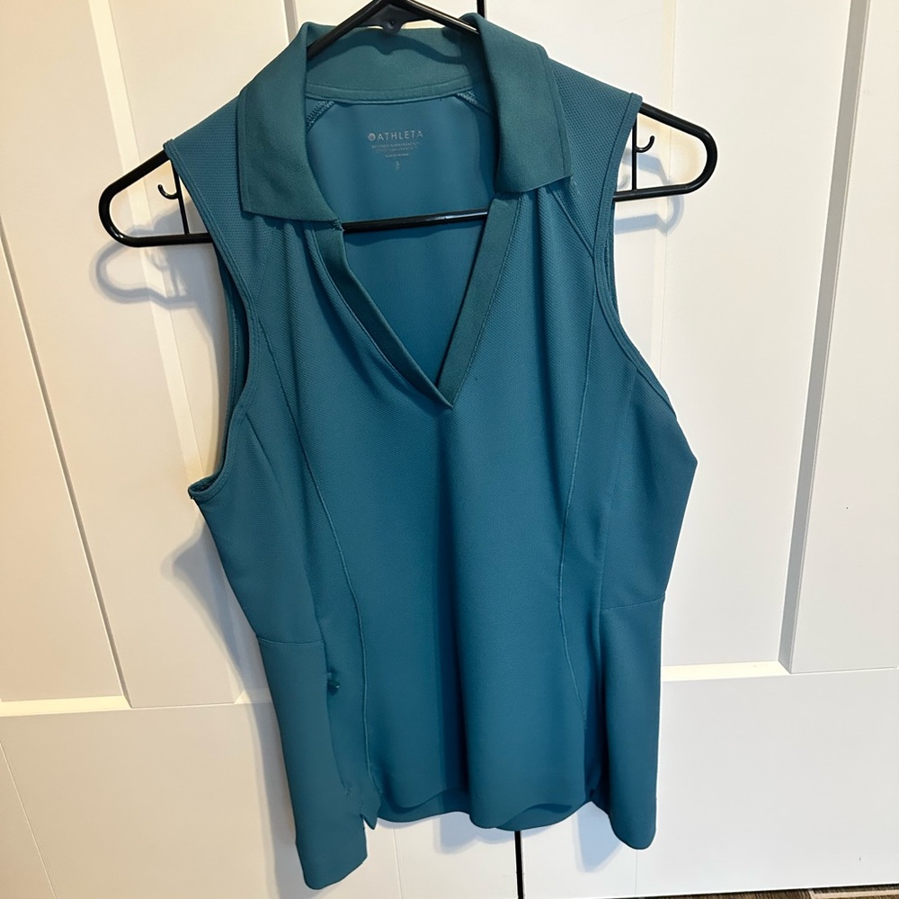 Athleta golf shirt. Never worn
